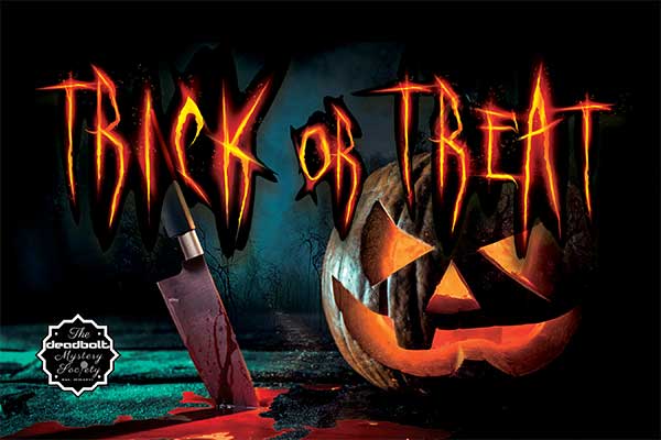 Trick or Treat game cover with Jack-o-Lantern and knife stuck in a table